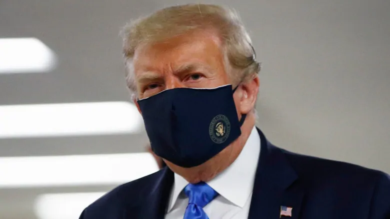 Trump wears face mask in public for 1st time during military hospital visit | CBC News