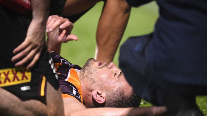 Corey Oates suffers sickening injury as Broncos routed by Wests Tigers