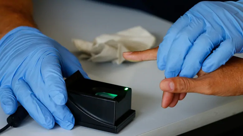 Feds relax fingerprinting rules while screening new hires during pandemic | CBC News