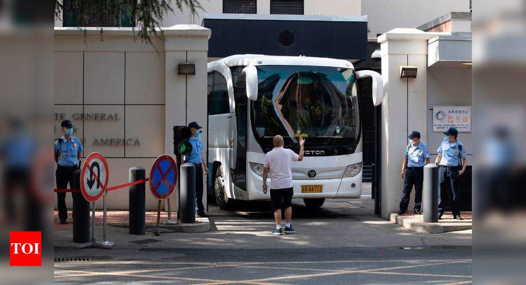 Staff leaving US Chengdu consulate under high security as deadline looms