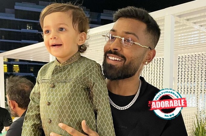 ADORABLE! Hardik Pandya and his son Agastya are engrossed on this e book; gape pic