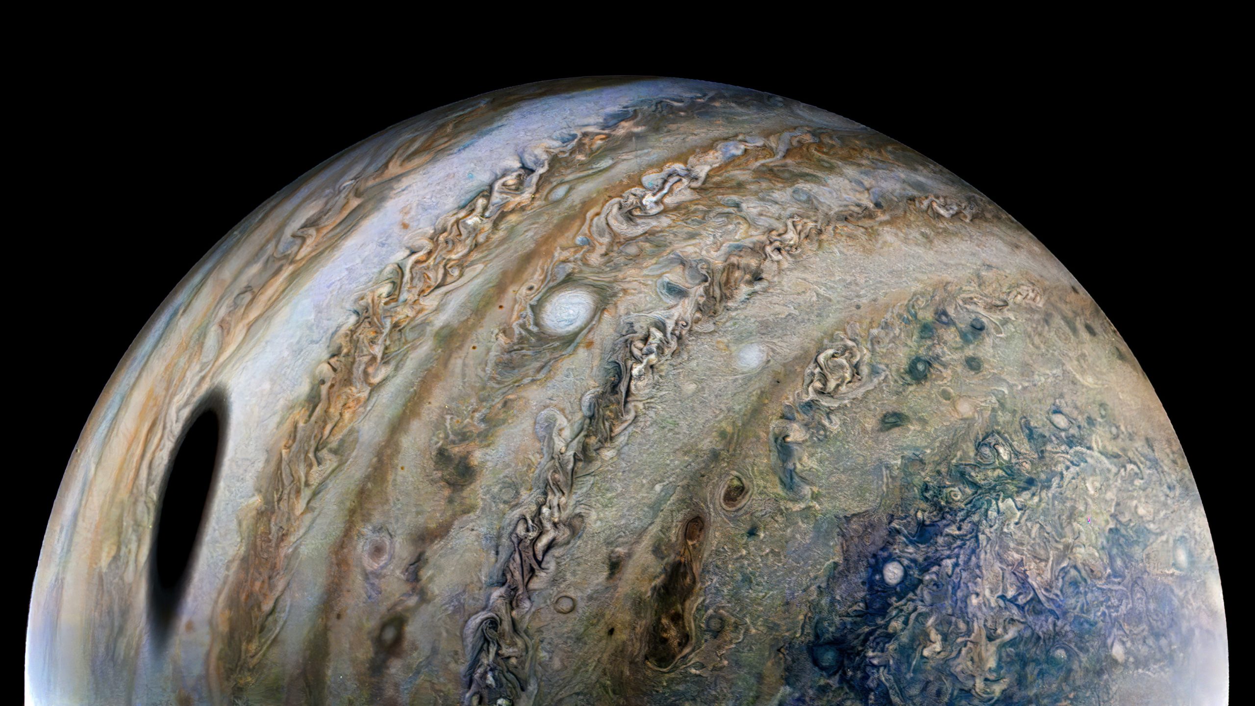 Ganymede Casts a Huge Shadow Across Jupiter in Spectacular New Image From NASA’s Juno Spacecraft