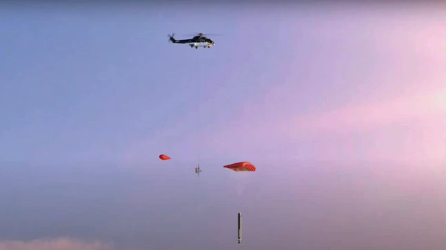 Rocket Lab wants to catch a building-sized rocket falling from space using helicopter. Here’s how