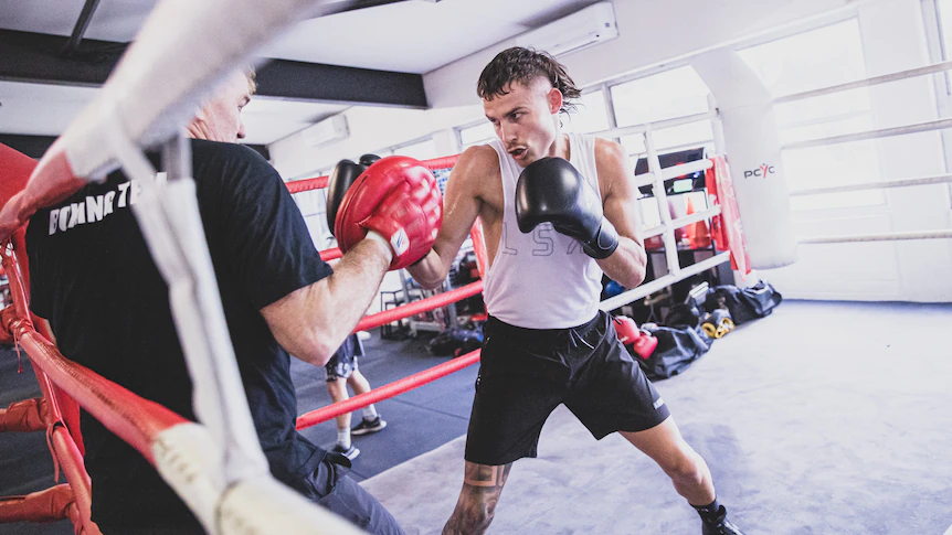 Harry Garside prepares to defend his Australian lightweight title — but his priorities race smartly beyond boxing – ABC Files