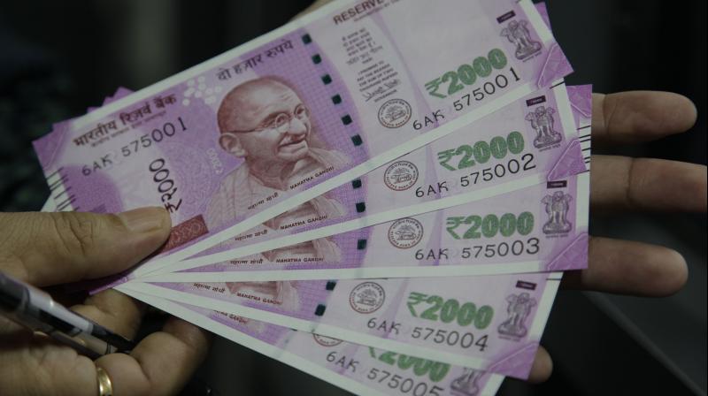 Indian Rupee slumps to all-time low of 77.42 against US buck