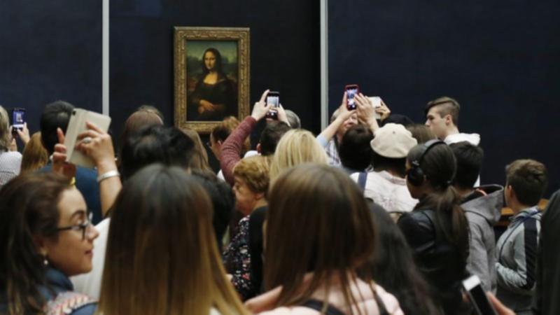 Enviro-protester smears Mona Lisa in cream