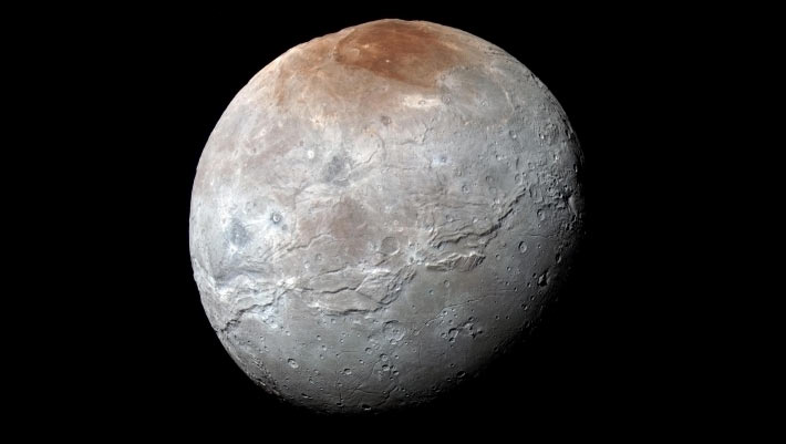 Fresh Be taught Sheds Mild on Origin of Charon’s Purple Polar Cap