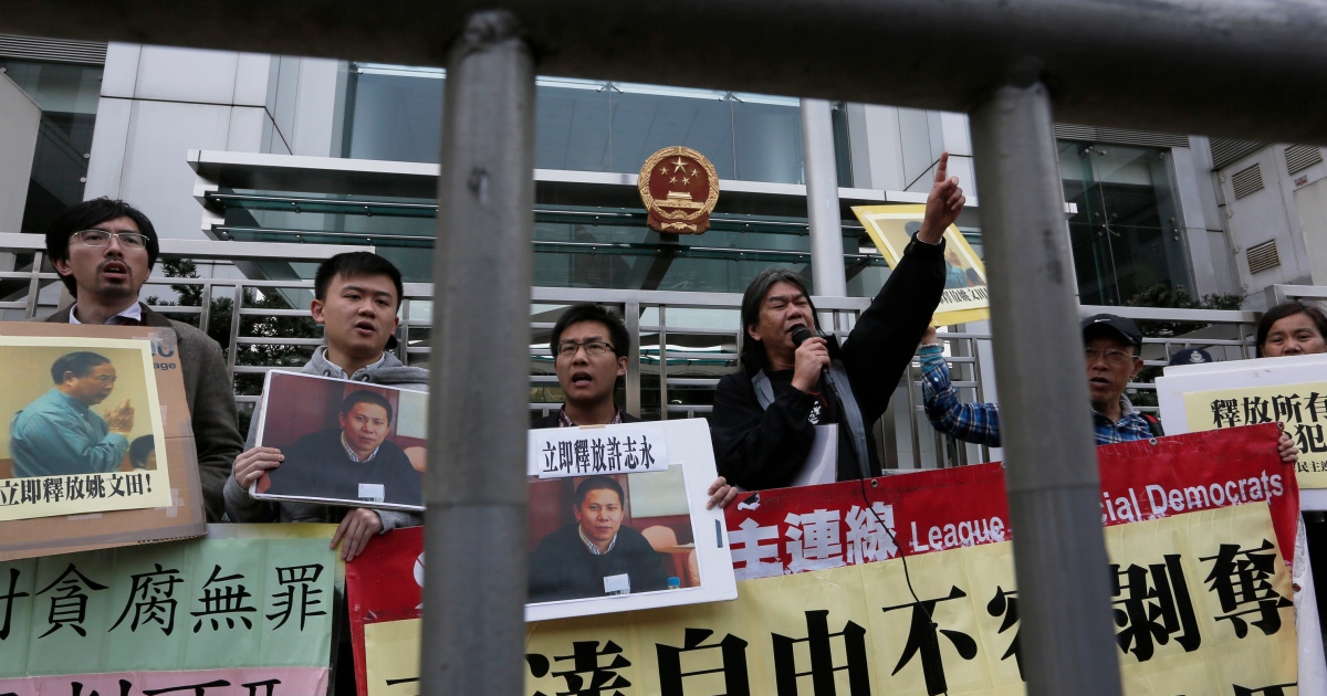 Two Chinese activists face trial over civil society summit