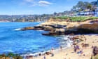 Beachgoers cruise sparring sea lions in viral video: ‘Godzilla is chasing them’