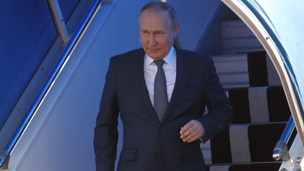 Vladimir Putin effectively being concerns as he’s considered with arm inserting limply by facet as he arrives in Iran