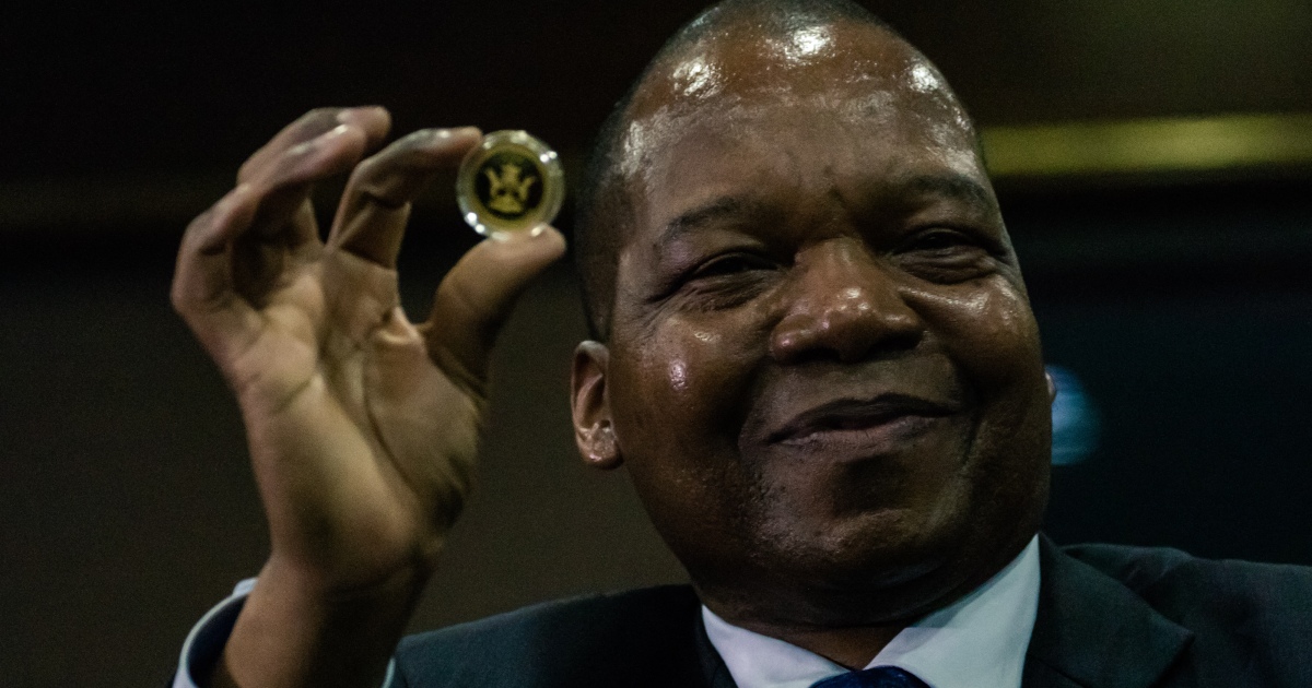 Zimbabwe launches gold coins to stem inflation