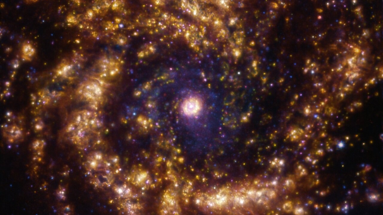 Starburst galaxy shines in fresh ‘whirlpool of gold’ photograph