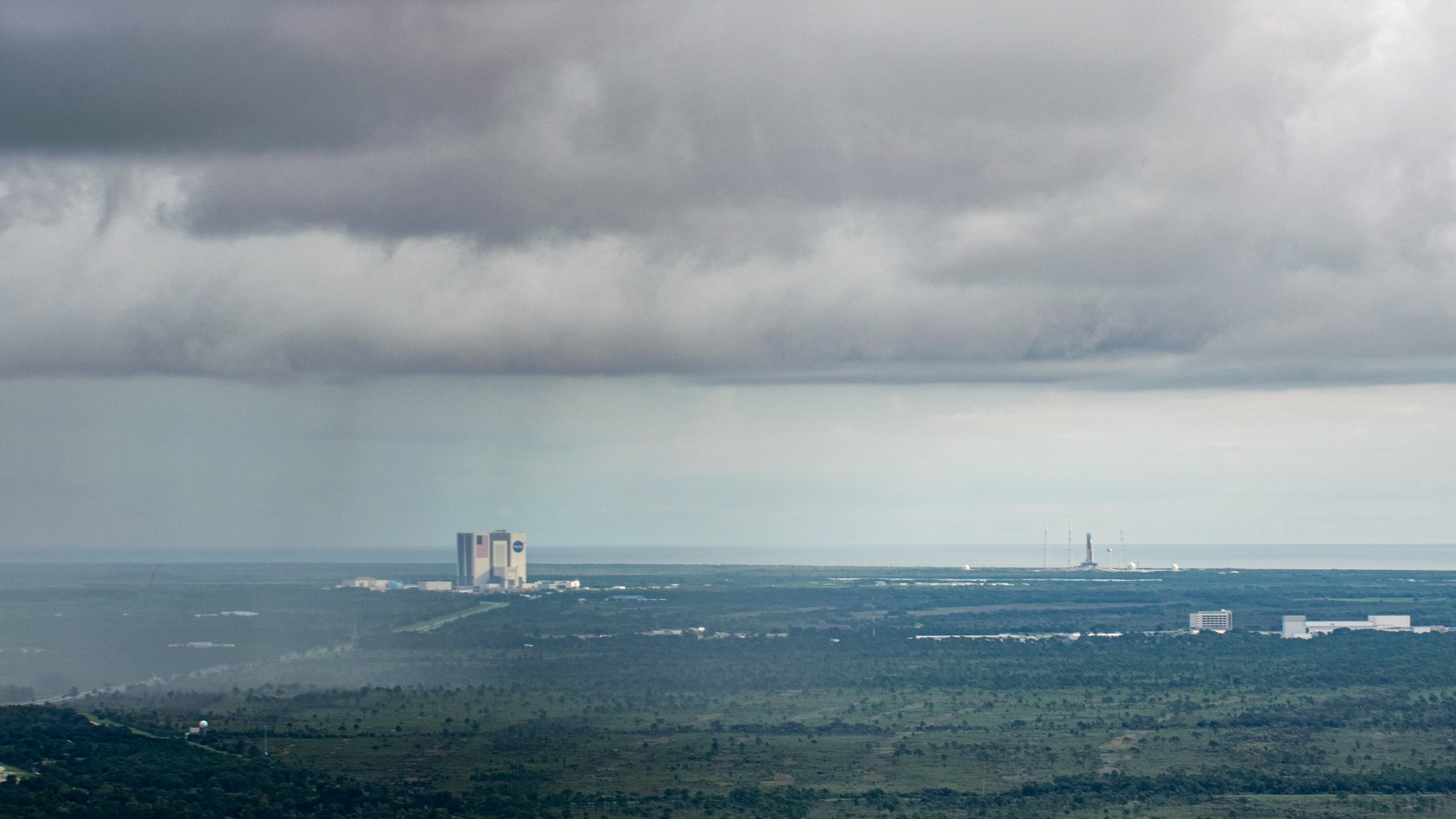 NASA’s Artemis 1 moon rocket faces stormy skies in incredible aerial photos