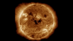 The sun’s ominous ‘smile’ has Earth on solar storm watch this Halloween weekend