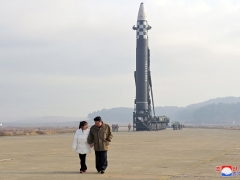 North Korea’s Kim Jong Un exposes child at rocket launch