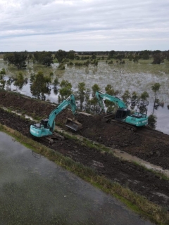 If these farmers’ flood levees do not hold, they stand to lose whatever