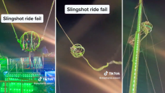 View: Teenagers left dangling high above crowd after slingshot flight breakdowns