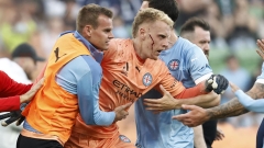 A-League pitch intrusion: Melbourne derby deserted after fans attack City goalkeeper Tom Glover