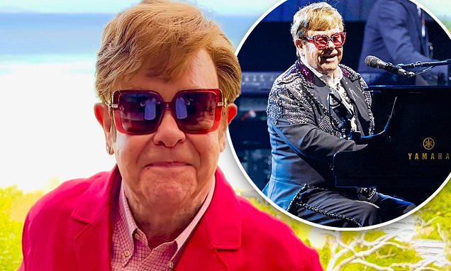 Elton John wants fans Happy New Year from Hayman Island ahead of trip – Daily Mail