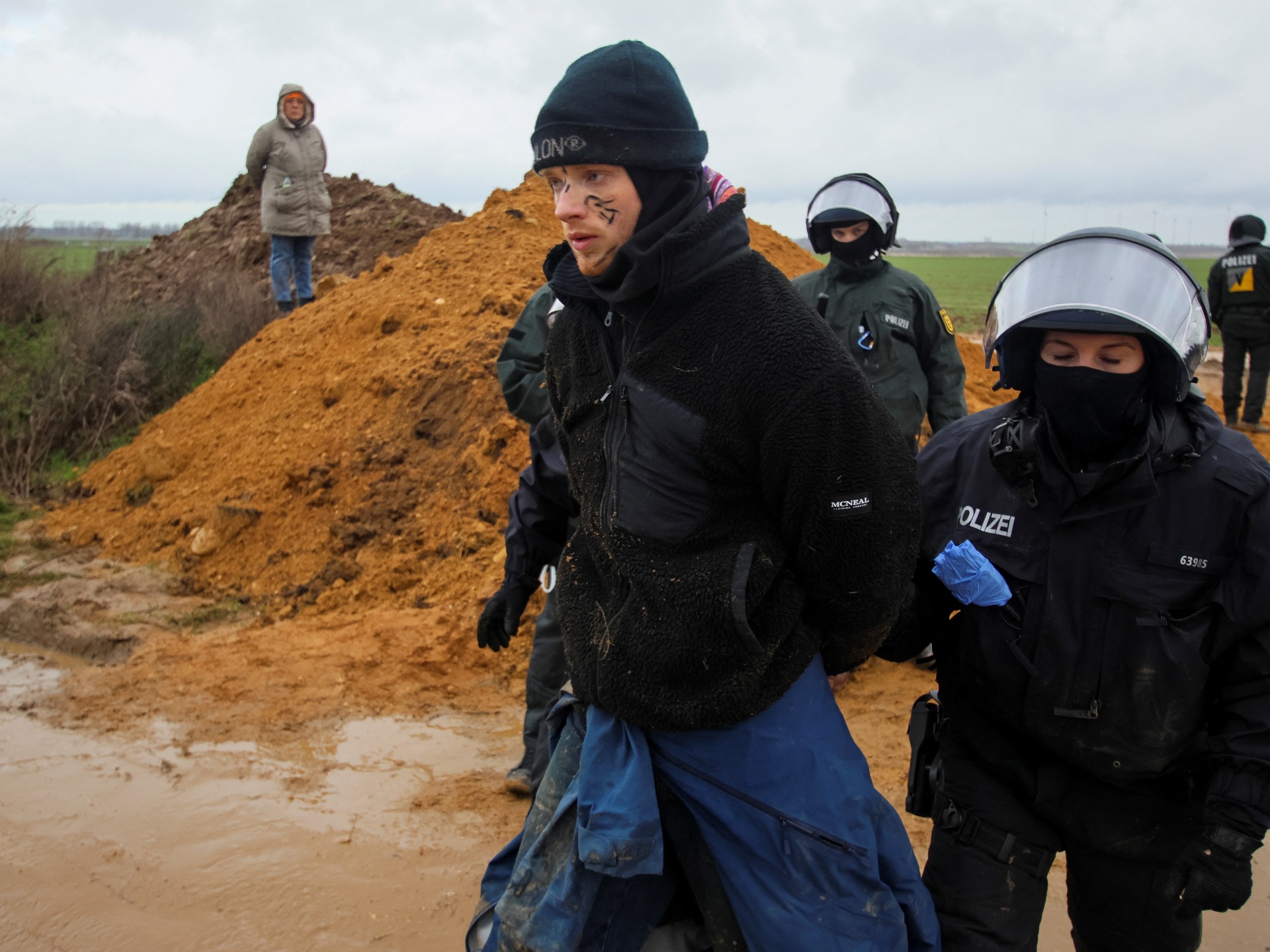 German coal mine standoff intensifies as authorities proceed protesters