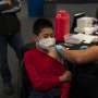 California will not need COVID vaccine to go to schools