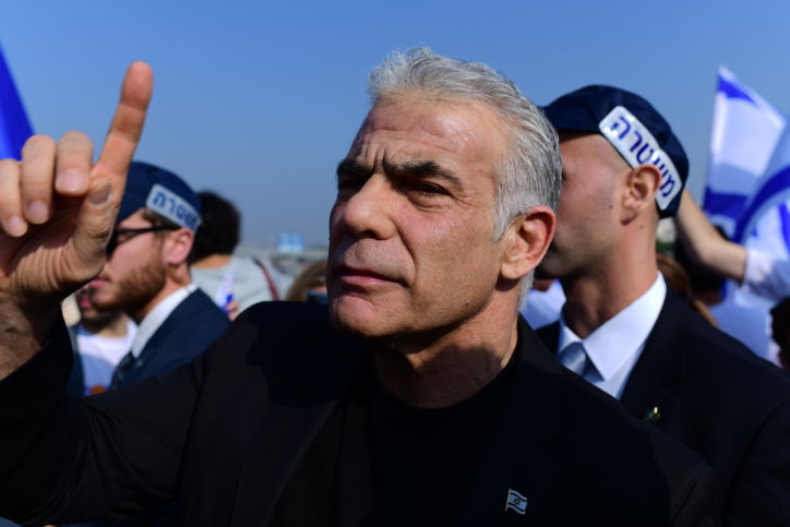 Lapid vows to defeat ‘terror-supporting’ Netanyahu government