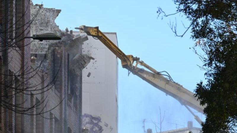 Sydneysiders view as demolition of historical structure gutted by fire starts