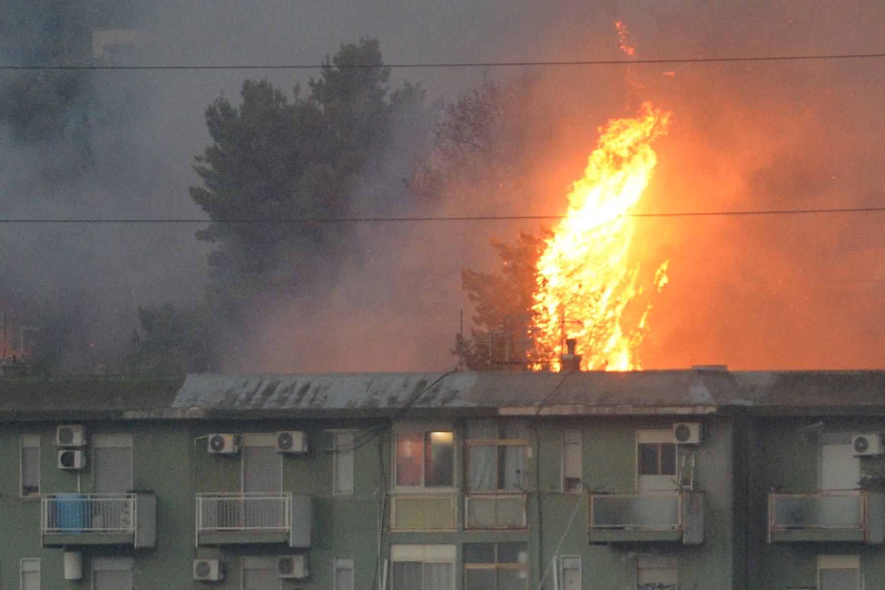 Fires kill 3 individuals in Sicily; Greece sees some wildfire break