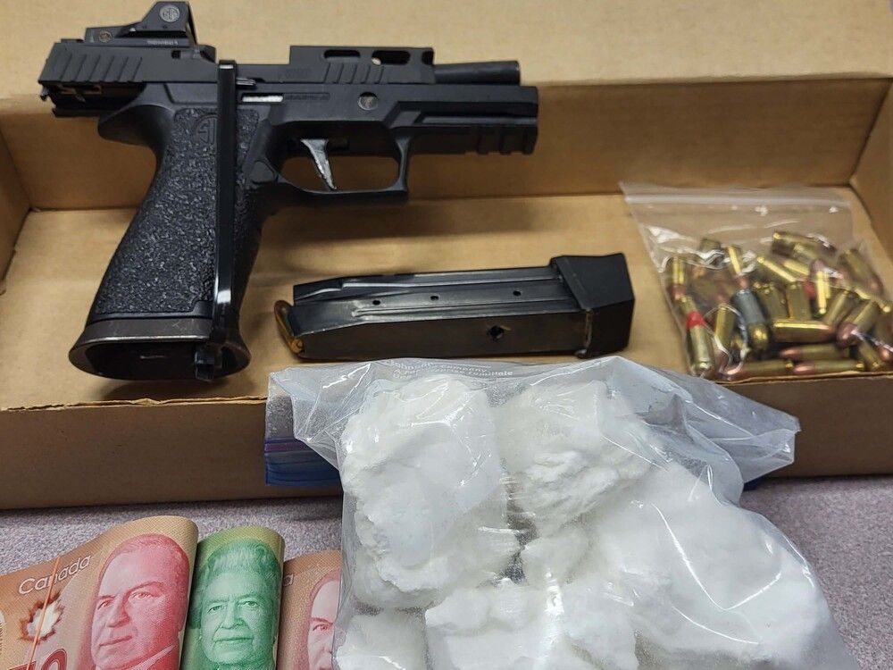 Packed pistol, thought drug and money took following authorities raid of Ottawa home