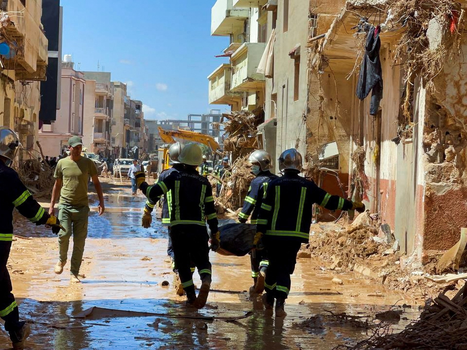 Competing federal governments work together to assist Libya’s flood victims as anguish stacks on