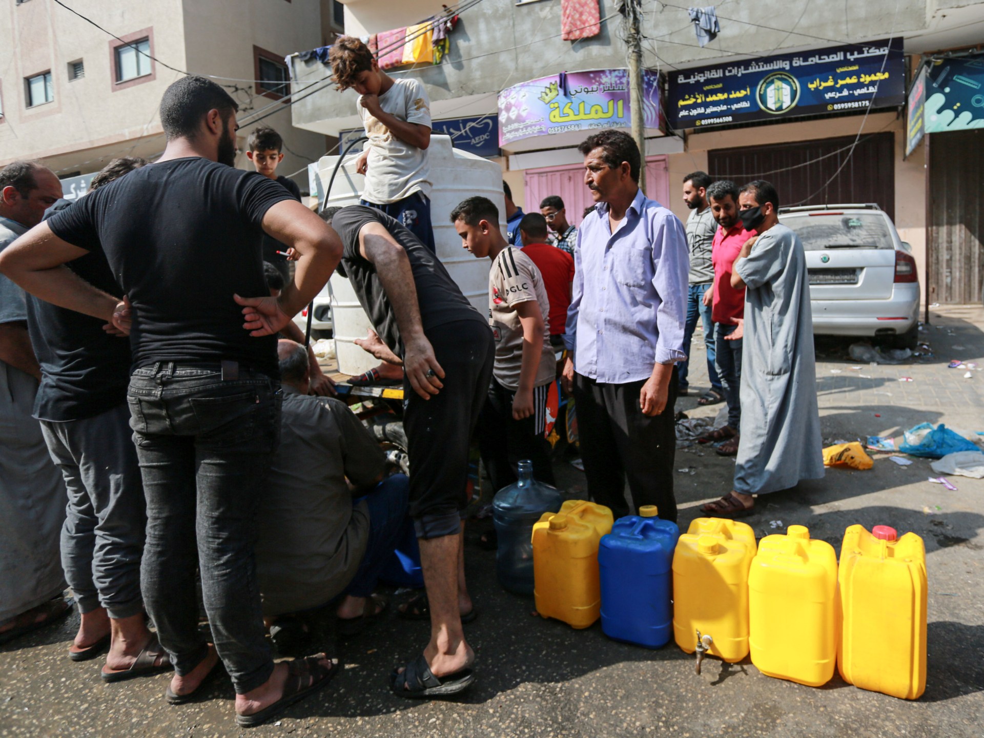 Shopping, queuing for bread, trying to find water: Life in Gaza City continues