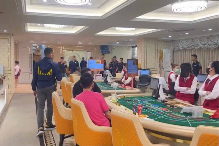 Unlawful gambling establishment covered 2 rented hotel floorings