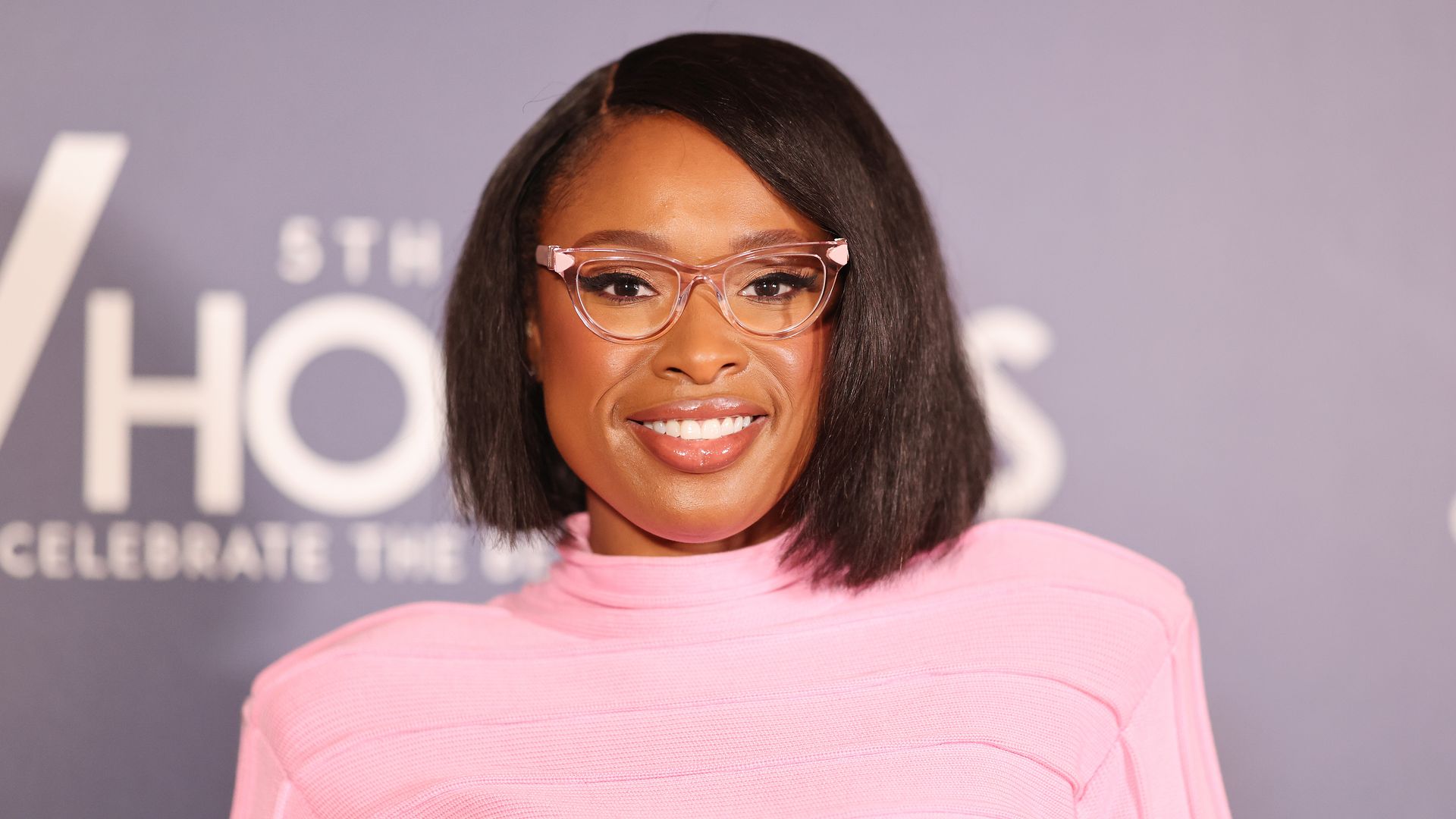 Jennifer Hudson turns heads as she showcases toned legs in pink mini-dress