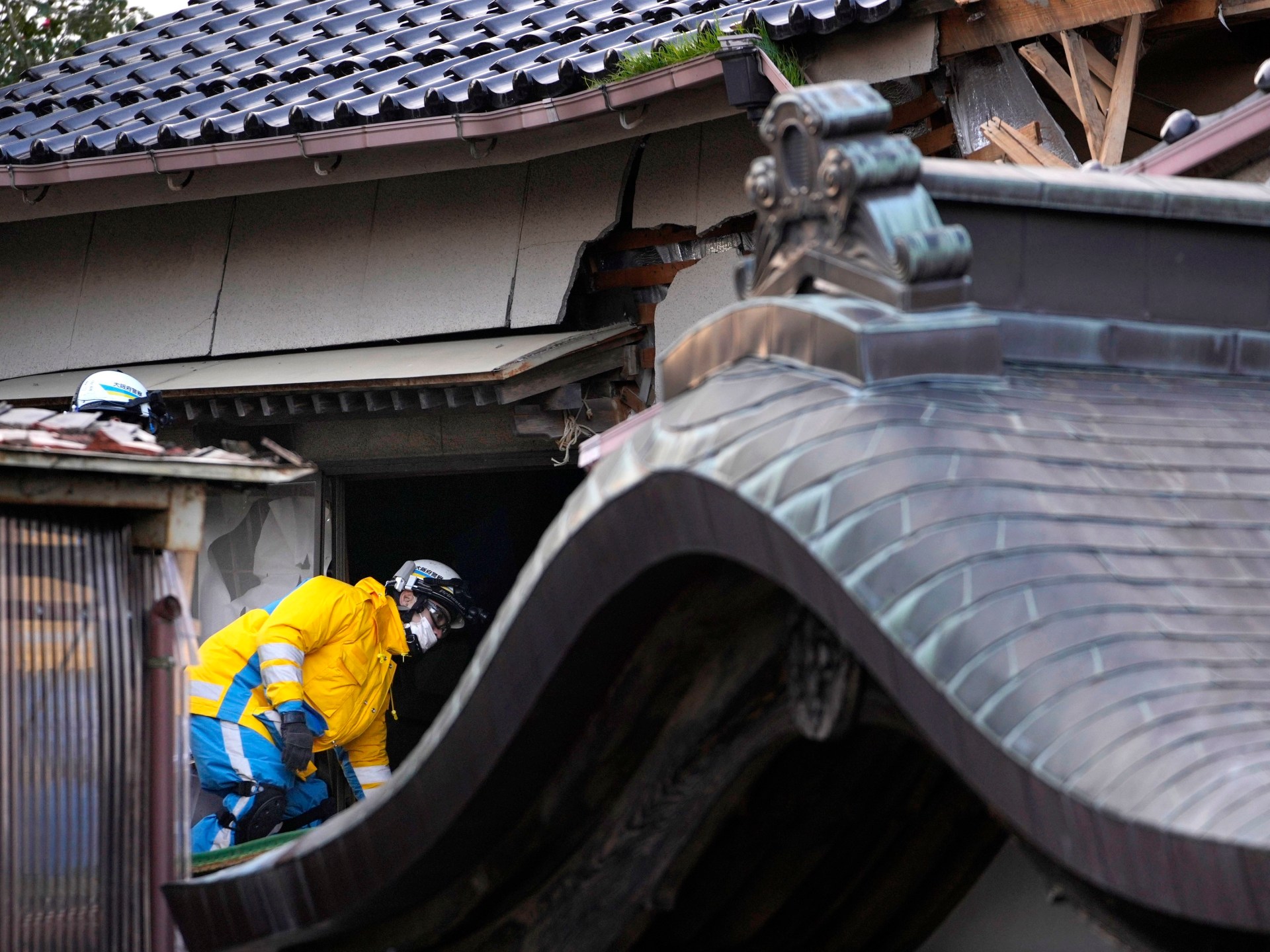 Female in her 90s pulled alive from debris of Japan earthquake