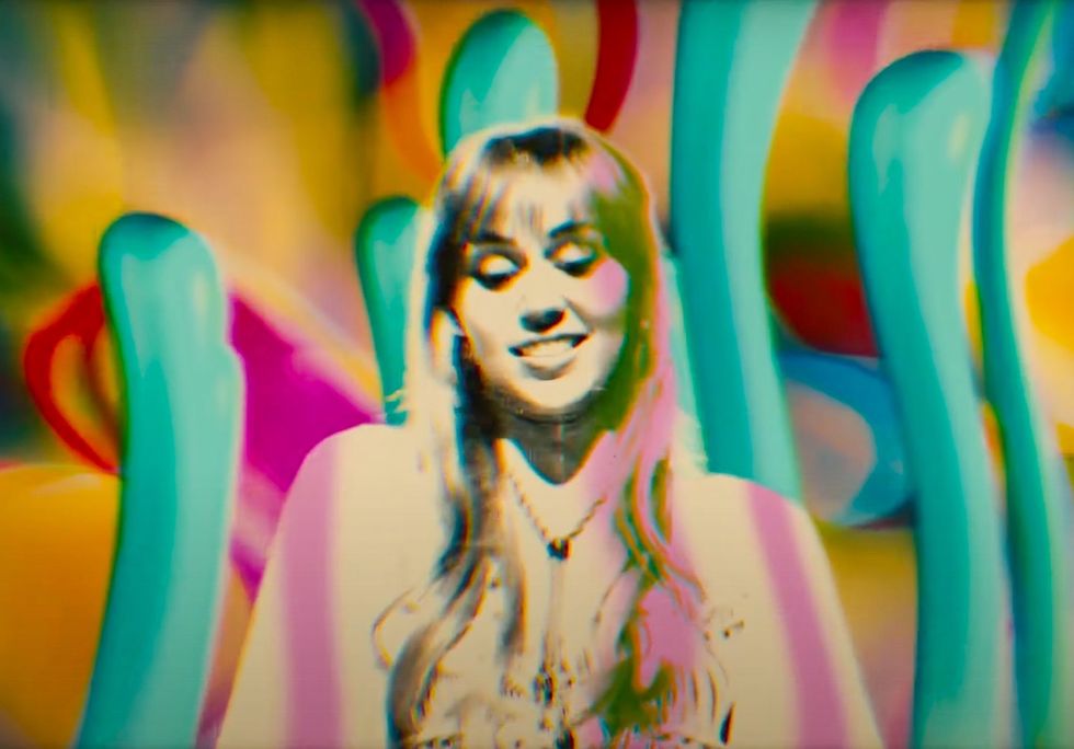 Miley Cyrus’ Trippy Drive-Away Dolls Cameo, Explained