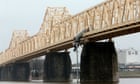 Kentucky firemen abseils off bridge to rescue dangling truck chauffeur