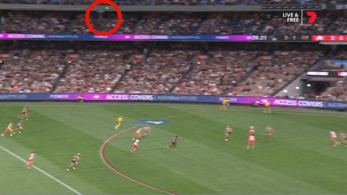 AFL reacts after the ball strikes spider-cam throughout Collingwood’s MCG clash with Sydney