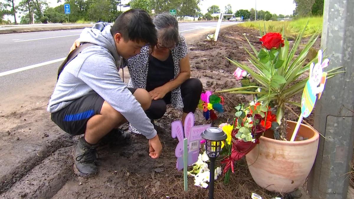 Relative fulfill at scene of triple-fatal crash on Bruce Highway, Maryborough