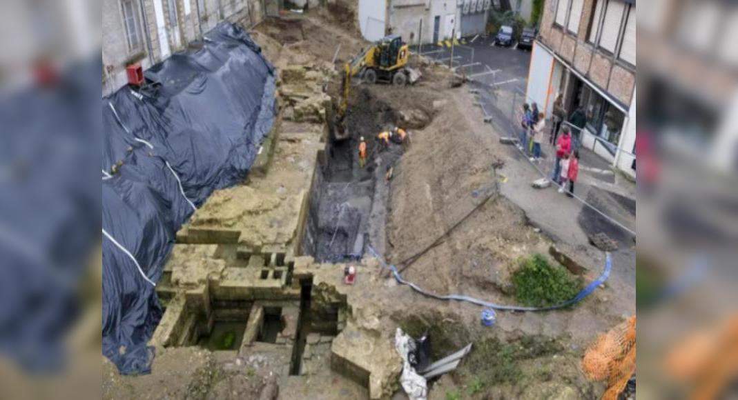 14th-century strengthened castle uncovered below this French hotel by archaeologists.