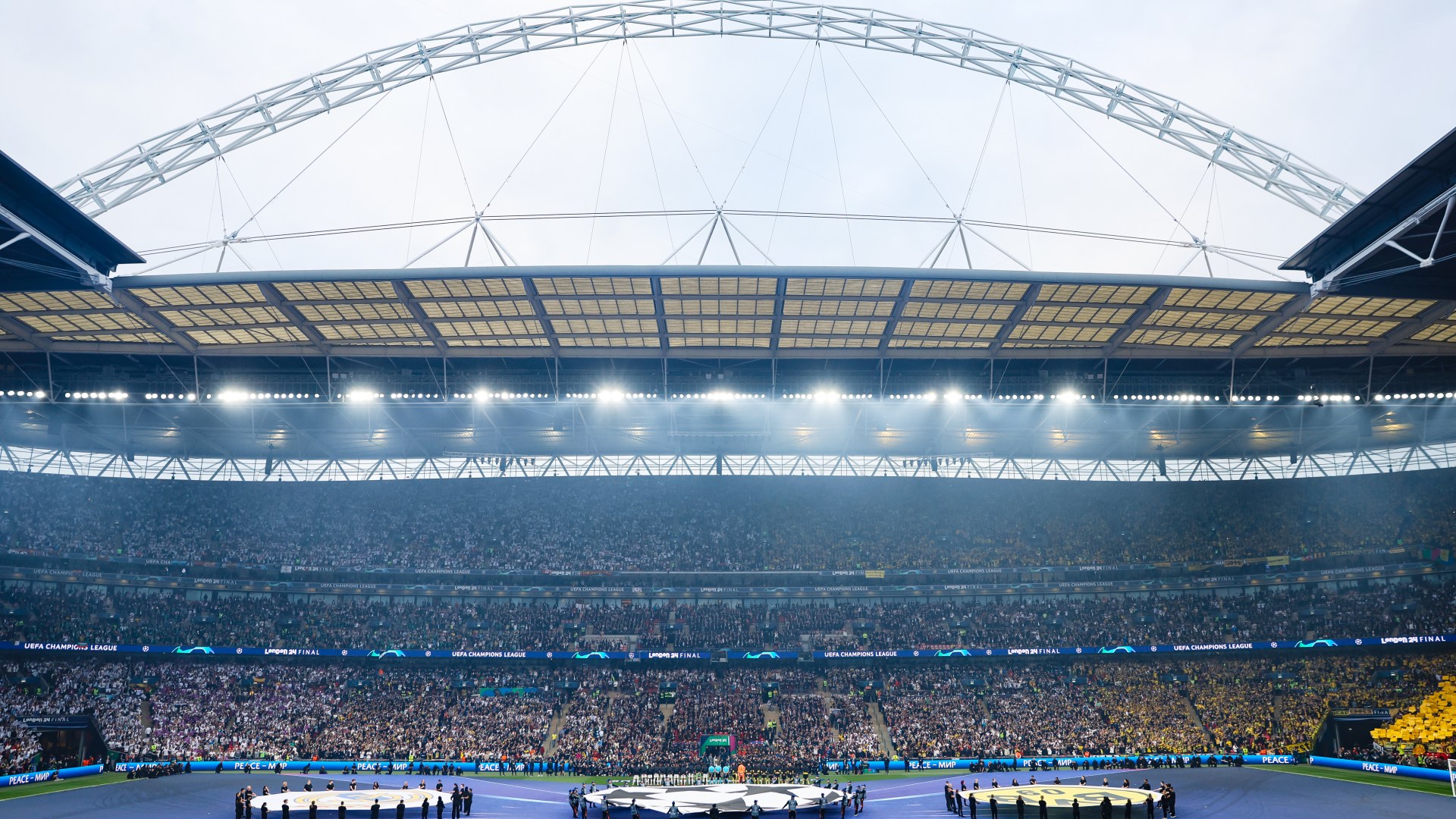 3 individuals consisting of school child, 16, charged after fans attacked pitch throughout Champions League last at Wembley