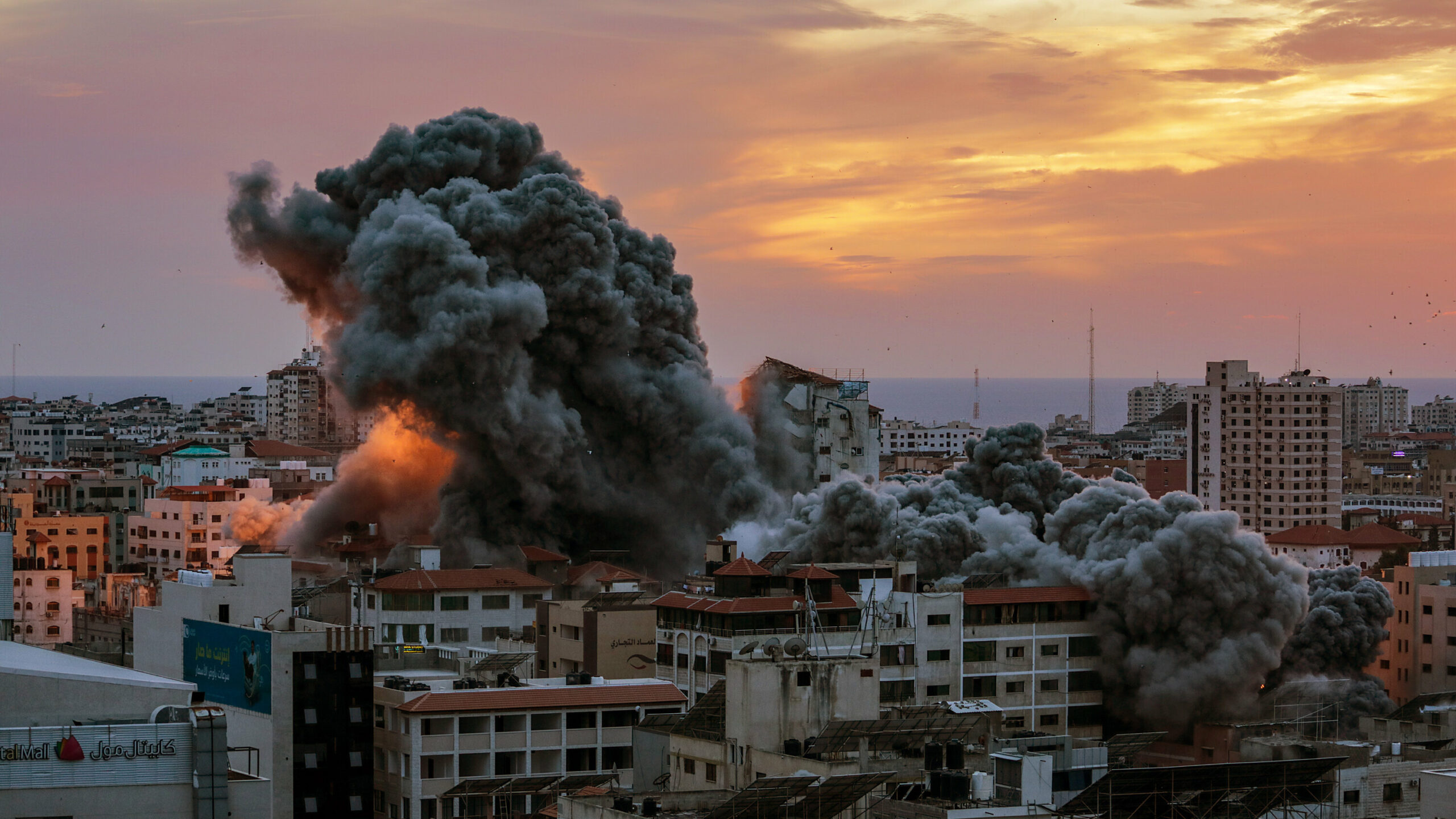 Israeli attacks kill over a dozen people as war on Gaza enters 12th month