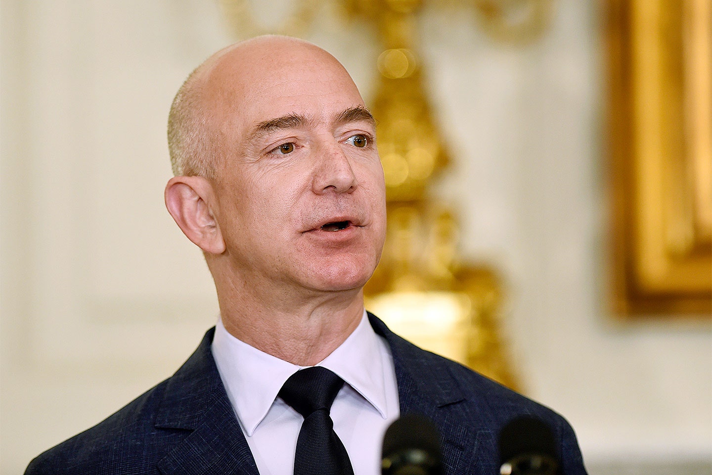 Bezos deals with criticism after executives met Trump on day of Post’s non-endorsement