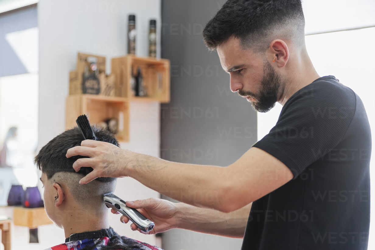 NSW teenage barber, 15, goes viral on TikTok with home haircuts