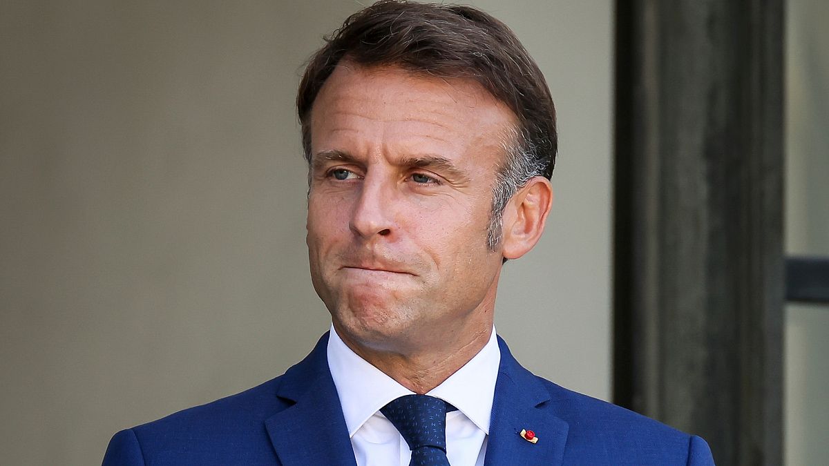 French President Emmanuel Macron downplays video that appears to show wife Brigitte slapping him