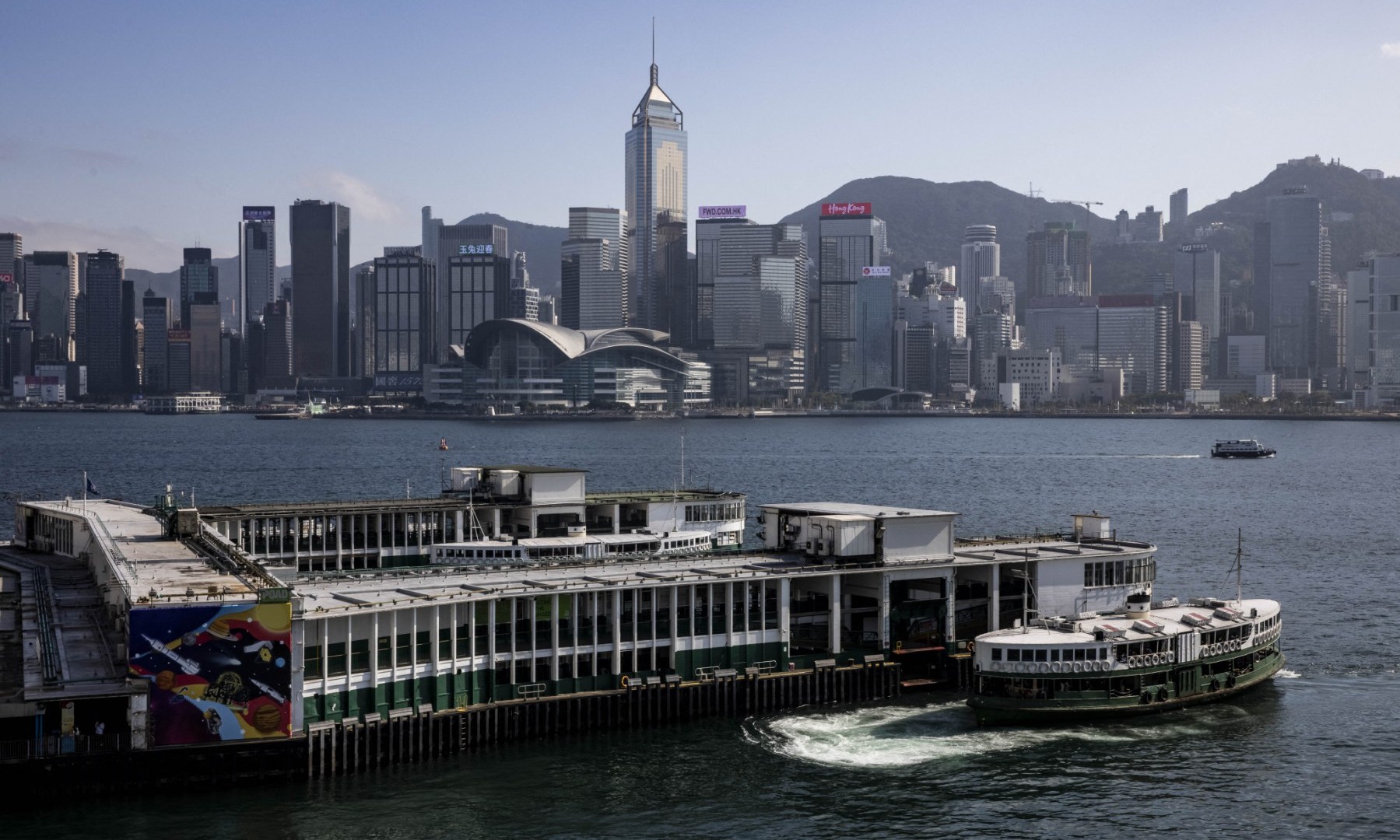 Hong Kong cancels passports, bans financial support for wanted activists