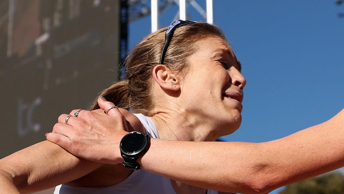 Jessica Stenson in tears after breaking Australian marathon record in Spain