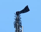 Two people unfold banner atop Empire State Building in apparent marriage proposal stunt