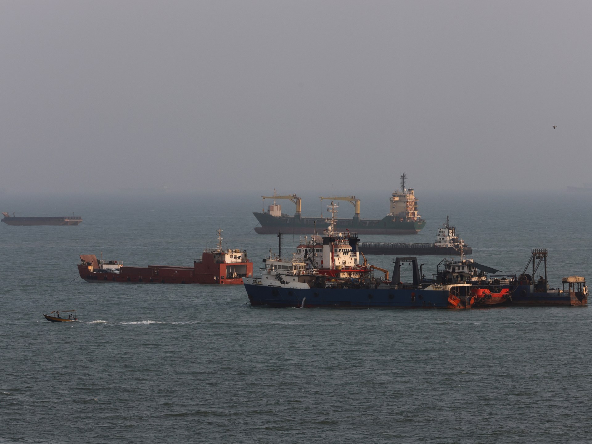 Vessel hit by ‘unknown projectile’ in Strait of Hormuz, UKMTO says